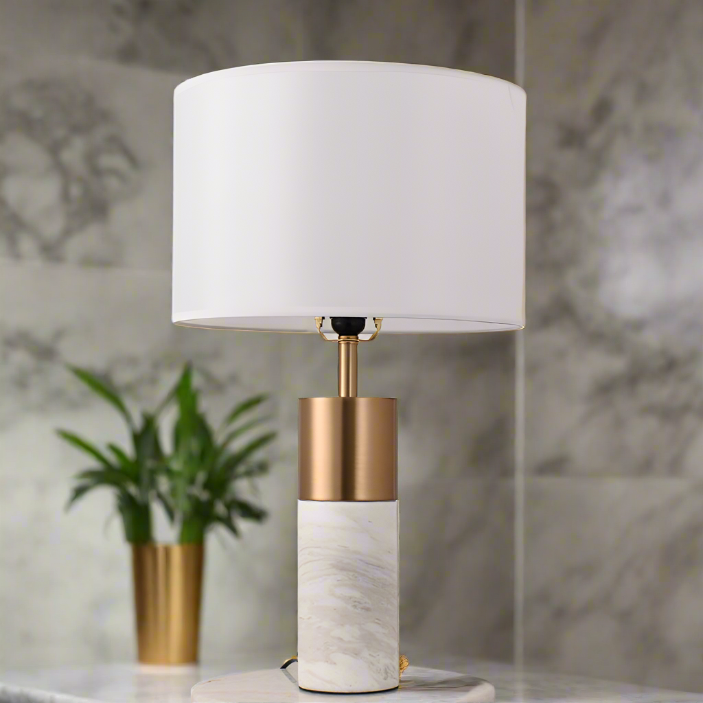 Table lamp with white shade and marble base in a room setting